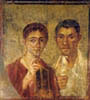 Ritratto di Terentius Neo e della moglie (età neroniana), da Pompei. L'uomo esibisce un rotolo sigillato con la ceralacca rossa tipica dei papiri documentari, la donna regge un trittico di tabulae ceratae e porta lo stilo alle labbra in atteggiamento pensoso